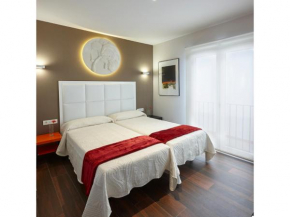 Apartamentos Caballerizas Granada con parking gratuito en pleno centro